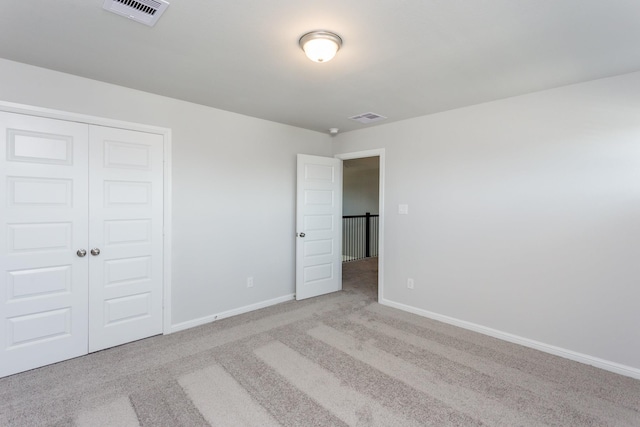 8506 Belfast Manor Ln, Richmond, TX 77407 - unfurnished bedroom with carpet floors and a closet