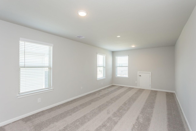 8506 Belfast Manor Ln, Richmond, TX 77407 - empty room featuring recessed lighting and light carpet