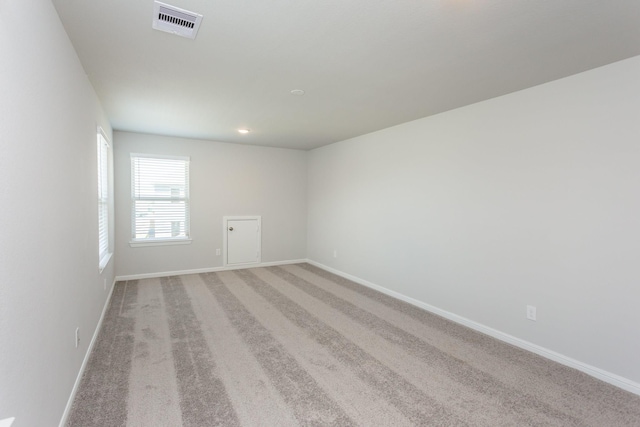 8506 Belfast Manor Ln, Richmond, TX 77407 - spare room with light carpet and recessed lighting