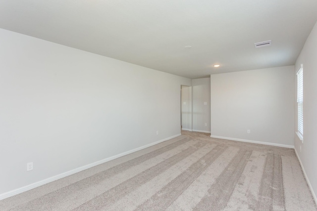 8506 Belfast Manor Ln, Richmond, TX 77407 - spare room featuring light carpet and recessed lighting