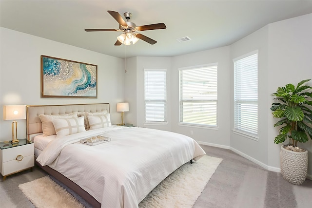 8506 Belfast Manor Ln, Richmond, TX 77407 - carpeted bedroom with baseboards and a ceiling fan