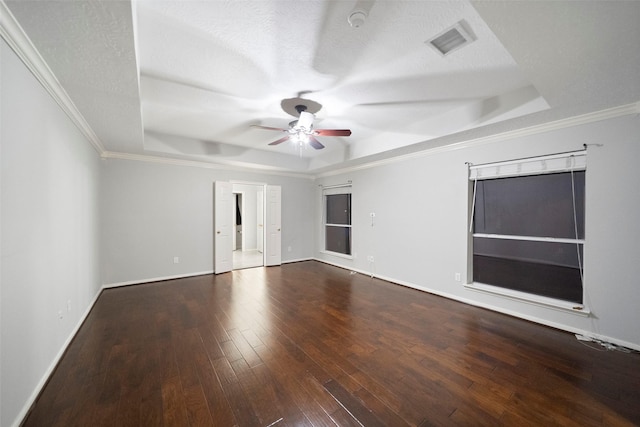 8014 Sports Haven Dr, Humble, TX 77346 - empty room featuring a raised ceiling, a ceiling fan, hardwood / wood-style floors, and ornamental molding