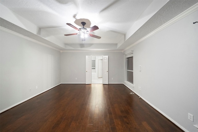 8014 Sports Haven Dr, Humble, TX 77346 - unfurnished room with a tray ceiling, a ceiling fan, hardwood / wood-style flooring, and a textured ceiling