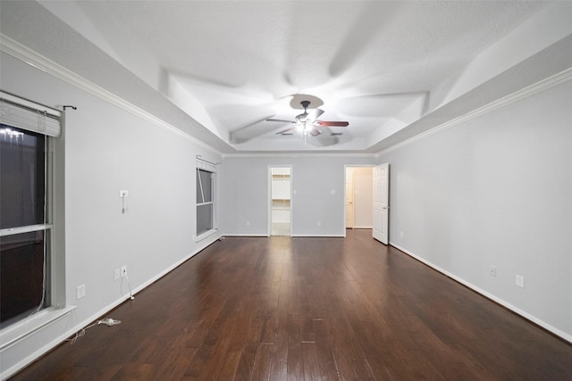 8014 Sports Haven Dr, Humble, TX 77346 - spare room featuring ceiling fan, wood finished floors, and a tray ceiling