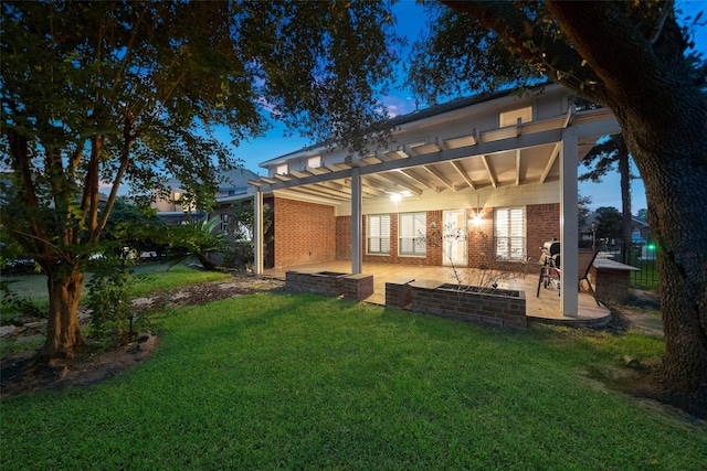 8014 Sports Haven Dr, Humble, TX 77346 - rear view of property with a patio, a pergola, brick siding, and a yard