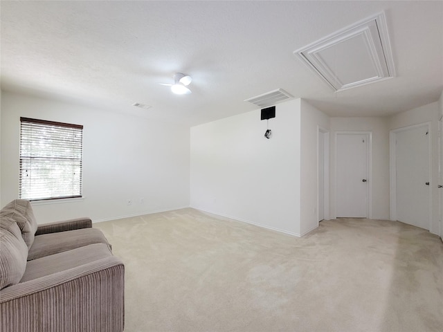 18403 Fair Grange Ln, Cypress, TX 77433 - unfurnished living room featuring attic access and light colored carpet