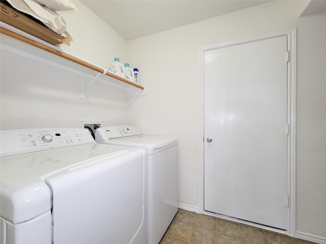 18403 Fair Grange Ln, Cypress, TX 77433 - laundry room featuring washing machine and dryer and baseboards