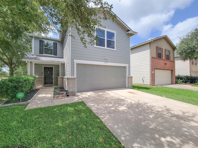 18403 Fair Grange Ln, Cypress, TX 77433 - traditional home with driveway, a garage, brick siding, and a front yard