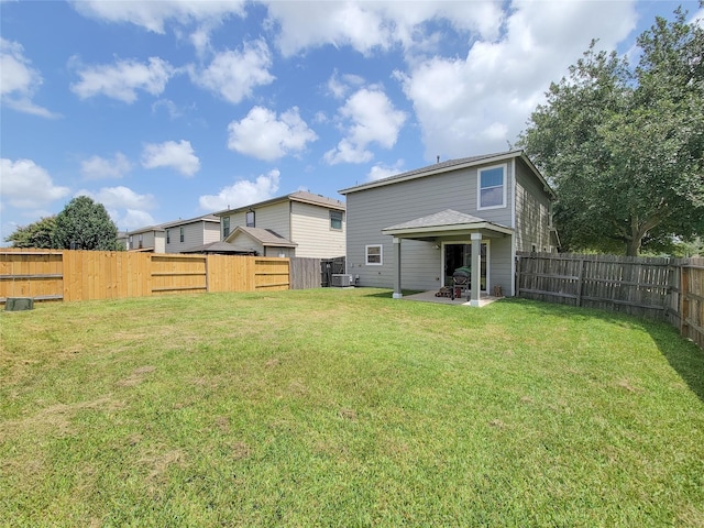 18403 Fair Grange Ln, Cypress, TX 77433 - rear view of house featuring a patio area and a fenced backyard