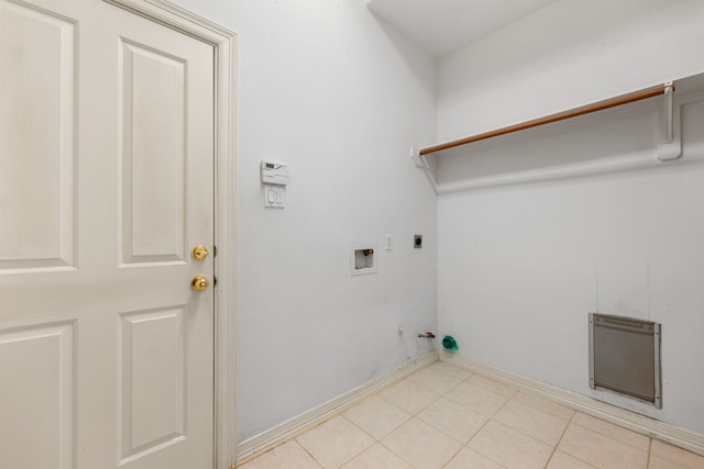7615 Brae Acres Ct, Houston, TX 77074 - laundry area with hookup for a washing machine, hookup for an electric dryer, gas dryer hookup, and light tile patterned flooring