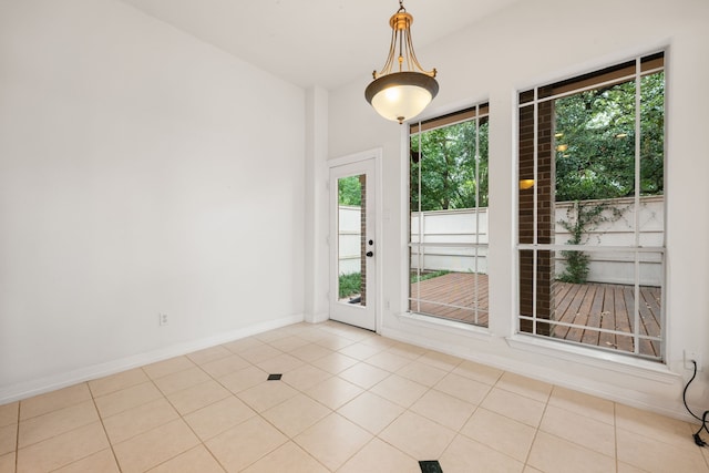 7615 Brae Acres Ct, Houston, TX 77074 - unfurnished dining area with tile patterned floors and baseboards