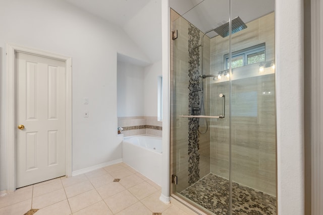 7615 Brae Acres Ct, Houston, TX 77074 - bathroom with a bath, a stall shower, tile patterned floors, and vaulted ceiling