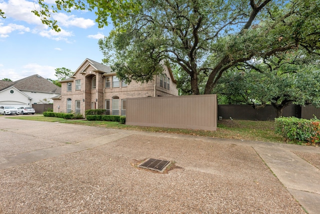 7615 Brae Acres Ct, Houston, TX 77074 - view of front of property with brick siding