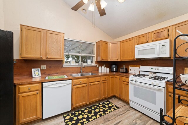 3060 High Plains Dr, Katy, TX 77449 - kitchen featuring white appliances, vaulted ceiling, light wood finished floors, and ceiling fan