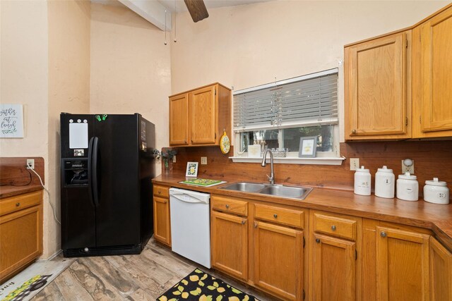 3060 High Plains Dr, Katy, TX 77449 - kitchen featuring black refrigerator with ice dispenser, dishwasher, light wood finished floors, a ceiling fan, and butcher block counters