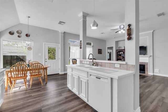 3731 Crescent Dr, Pearland, TX 77584 - kitchen featuring white dishwasher, dark wood finished floors, ceiling fan, decorative light fixtures, and vaulted ceiling