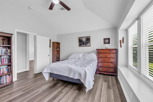 3731 Crescent Dr, Pearland, TX 77584 - bedroom featuring wood finished floors, ceiling fan, and high vaulted ceiling