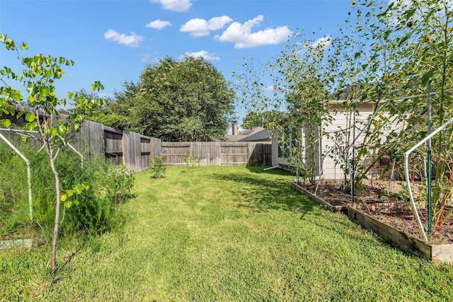 3731 Crescent Dr, Pearland, TX 77584 - fenced backyard featuring a vegetable garden
