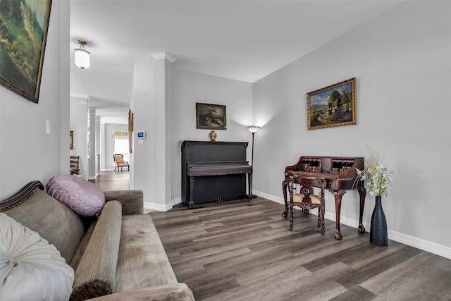 3731 Crescent Dr, Pearland, TX 77584 - living area with ornate columns and wood finished floors