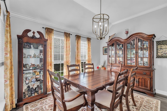 3731 Crescent Dr, Pearland, TX 77584 - dining area featuring ornamental molding, a chandelier, and wood finished floors