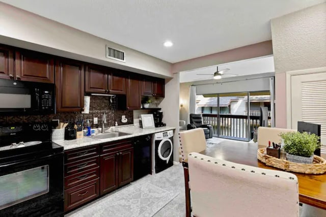 12900 Walden Rd Unit 706G, Montgomery, TX 77356 - kitchen featuring black appliances, washer / clothes dryer, a ceiling fan, light countertops, and decorative backsplash