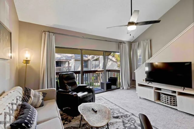 12900 Walden Rd Unit 706G, Montgomery, TX 77356 - living area featuring carpet flooring, ceiling fan, and vaulted ceiling