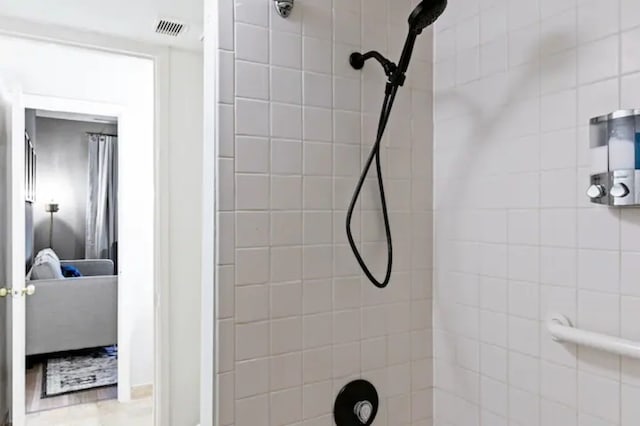 12900 Walden Rd Unit 706G, Montgomery, TX 77356 - ensuite bathroom featuring a tile shower