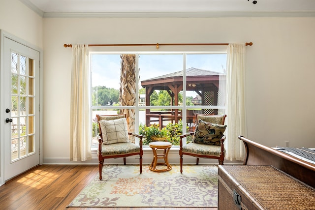 1267 Creekford Cir, Sugar Land, TX 77478 - sitting room featuring ornamental molding and wood finished floors