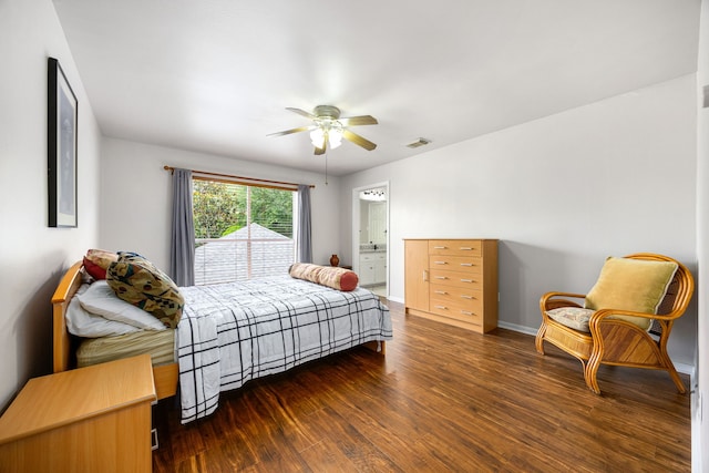 1267 Creekford Cir, Sugar Land, TX 77478 - bedroom with dark wood-style flooring, ensuite bathroom, and a ceiling fan