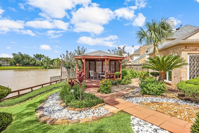 1267 Creekford Cir, Sugar Land, TX 77478 - view of yard with a gazebo and a deck with water view