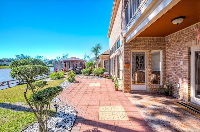 1267 Creekford Cir, Sugar Land, TX 77478 - view of patio featuring a gazebo and a water view