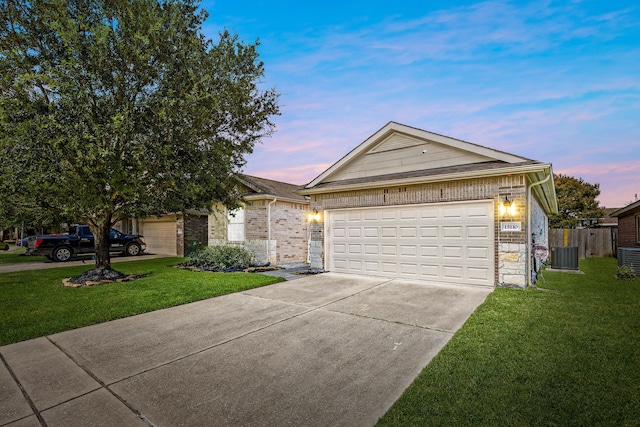 15110 Sierra Ridge Dr, Humble, TX 77396 - ranch-style home with a garage, concrete driveway, and brick siding
