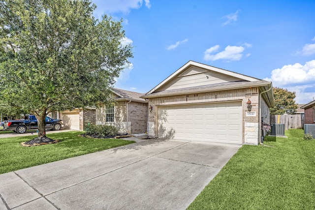 15110 Sierra Ridge Dr, Humble, TX 77396 - ranch-style house with brick siding, concrete driveway, and an attached garage