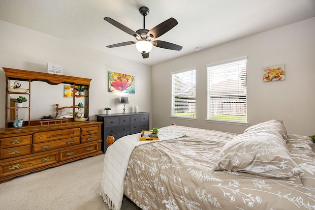 15110 Sierra Ridge Dr, Humble, TX 77396 - bedroom featuring light carpet and ceiling fan