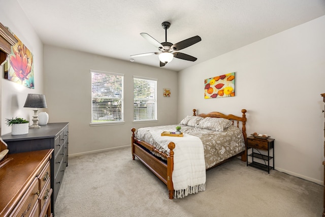 15110 Sierra Ridge Dr, Humble, TX 77396 - bedroom with light carpet and a ceiling fan