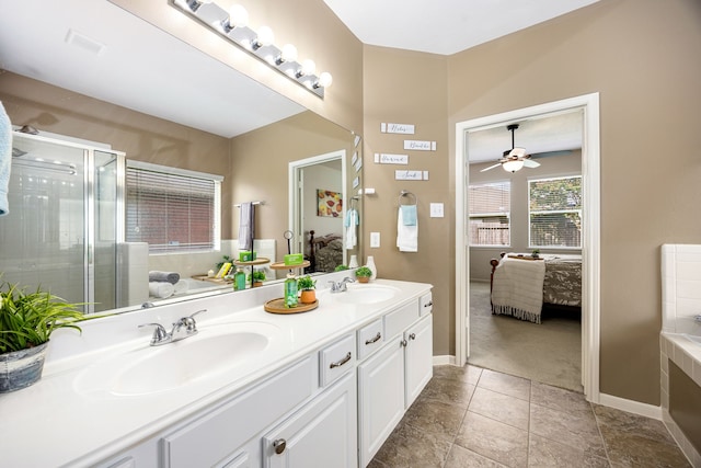 15110 Sierra Ridge Dr, Humble, TX 77396 - bathroom featuring ensuite bath, ceiling fan, double vanity, and a stall shower