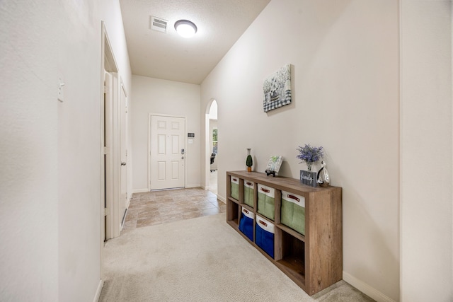 15110 Sierra Ridge Dr, Humble, TX 77396 - corridor with arched walkways and carpet flooring