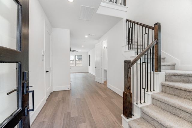 3217 Royal Oaks Hollow Ln, Houston, TX 77082 - entrance foyer with light wood finished floors, stairs, recessed lighting, and a ceiling fan