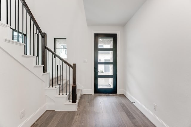 3217 Royal Oaks Hollow Ln, Houston, TX 77082 - foyer featuring wood finished floors and stairway