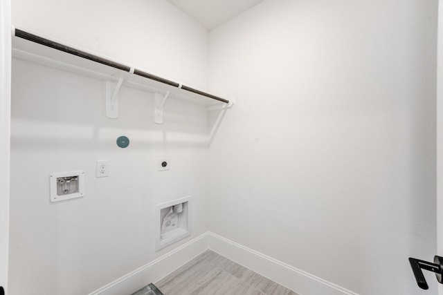 3217 Royal Oaks Hollow Ln, Houston, TX 77082 - laundry room featuring electric dryer hookup, washer hookup, and hookup for a gas dryer