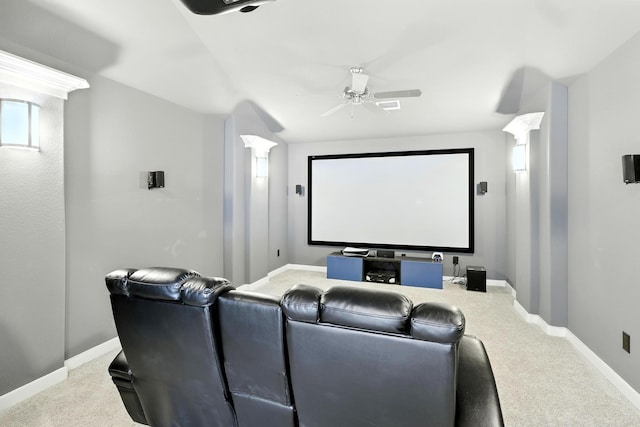 2607 Open Prairie Ln, Katy, TX 77493 - home theater room with a ceiling fan, carpet floors, and ornate columns