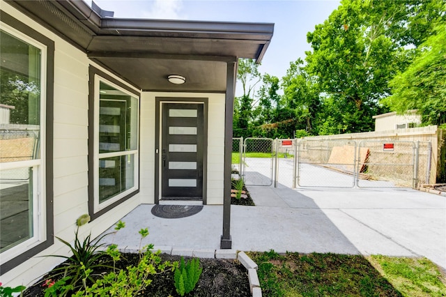 1221 Delores St, Kemah, TX 77565 - property entrance with a gate