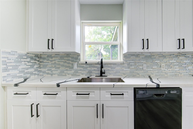 1221 Delores St, Kemah, TX 77565 - kitchen with dishwasher, light countertops, tasteful backsplash, and white cabinetry