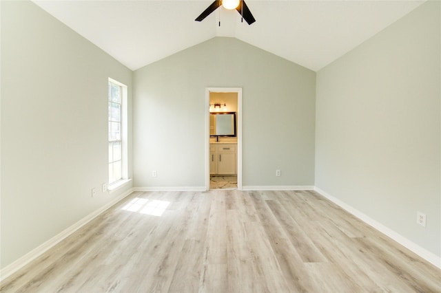 1221 Delores St, Kemah, TX 77565 - spare room featuring ceiling fan, light wood-type flooring, and vaulted ceiling