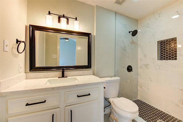 1221 Delores St, Kemah, TX 77565 - bathroom featuring tiled shower and vanity