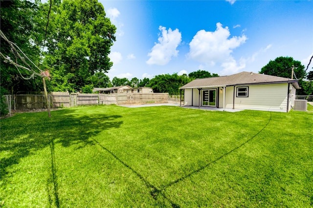 1221 Delores St, Kemah, TX 77565 - fenced backyard with a patio area