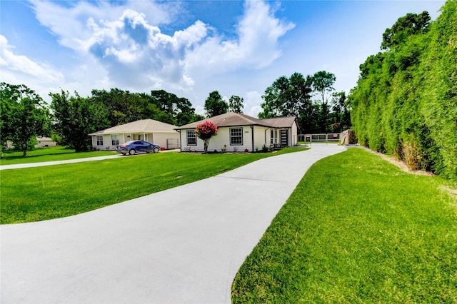 1221 Delores St, Kemah, TX 77565 - single story home featuring driveway and a front lawn