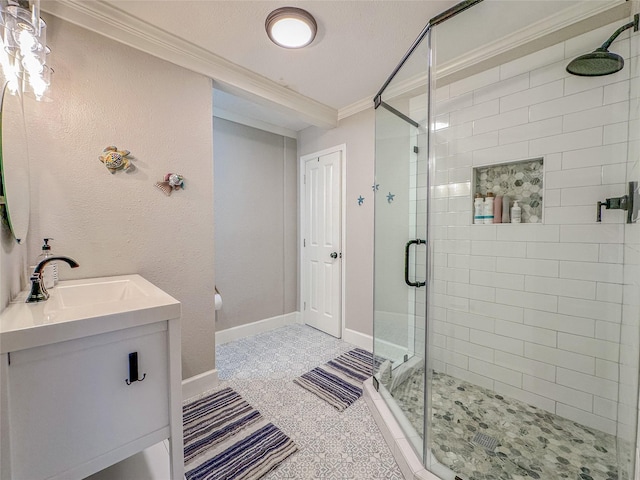 3128 Avenue N, Galveston, TX 77550 - bathroom featuring ornamental molding, a stall shower, and vanity