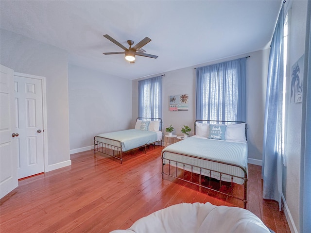 3128 Avenue N, Galveston, TX 77550 - bedroom featuring wood finished floors and a ceiling fan