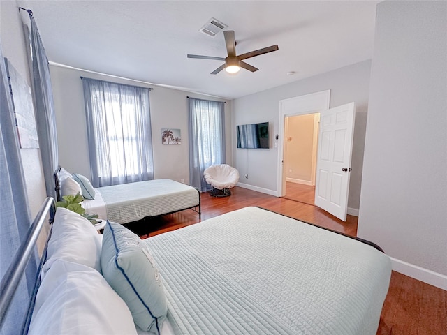 3128 Avenue N, Galveston, TX 77550 - bedroom featuring wood finished floors and ceiling fan
